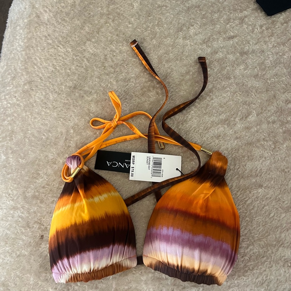 La Blanca Vibrant Multicolor Bikini Top halter
Sunset
NWT 
Size 4